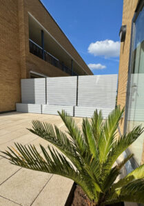 contemporary trellis fence panels in a light grey finish