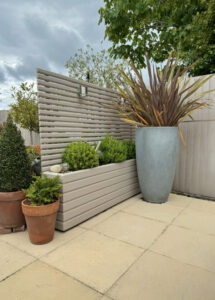 contemporary trellis fence panels in a natural wood finish