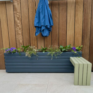 sage green wooden bench attached to a dark grey wooden planter