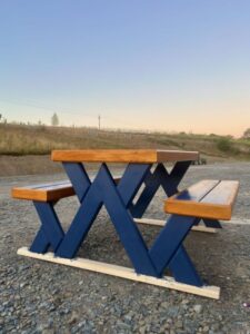 Contemporary Garden Picnic Bench on a rough gravel surface